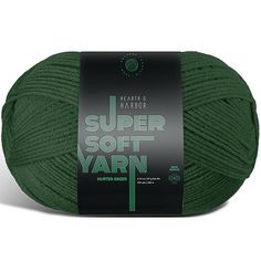 yarn ball in dark green with the words super soft yarn written on top and bottom