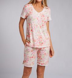 Soft and short pajamas with two print options to choose from. Set includes a button front top and shorts to match. Top has a V-neck with eyelet trim at front. Front fastens and unfastens with nine flower-shaped button closures made from genuine shell. Short sleeves with eyelet borders. Hem is decorated with pintucks and has side vents for a more open fit. Bottoms have a soft covered elastic waist that adjusts with drawstring ties at front. On-seam patch pockets. Pintucks above ends of legs. Leg Bermuda Pants, Short Pajamas, Button Front Top, Pajama Shorts, Pin Tucks, Pj Sets, Knit Cotton, Cap Sleeve, A Button