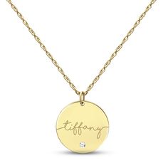 This gorgeous necklace features a 10K yellow gold disc inscribed with your name in an elegant script font. A bezel-set round diamond glitters beneath for a dazzling hint of sparkle. The pendant sways from an 18-inch rope chain that secures with a spring ring clasp. Classic Name Necklace For Anniversary, Classic Round Name Necklace For Anniversary, Classic Anniversary Name Necklace, Gold Round Name Necklace For Anniversary, Signature Yellow Gold Name Necklace, Signature Yellow Gold Jewelry For Anniversary, Elegant Round Disc Name Necklace For Anniversary, Personalized Round Yellow Gold Name Necklace, Engraved Round Name Necklace