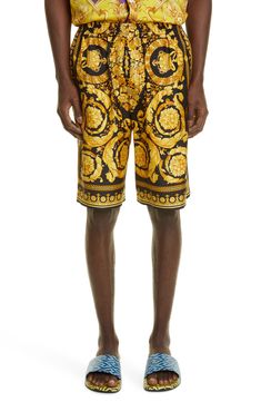 The brand's baroque-inspired filigree adds a statement-making signature look to these relaxed shorts cut from pure silk. Elastic waist 100% silk Dry clean Made in Italy Men's Designer Clothing Luxury Silk Bottoms For Summer, Silk Shorts, Signature Look, Versace Men, Designer Clothes For Men, Pure Silk, Silk Printing, Versace, Designer Clothing