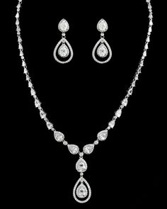 Stunning Teardrop CZ Crystal Bridal Necklace and Earring Jewelry Set Formal Teardrop Pendant Jewelry Sets With Cubic Zirconia, Formal Cubic Zirconia Jewelry Set With Teardrop Pendant, Teardrop Cubic Zirconia Hand Set Jewelry Sets, Hand Set Teardrop Cubic Zirconia Jewelry Sets, Hand-set Teardrop Cubic Zirconia Jewelry Sets, Wedding Jewelry Sets With Cubic Zirconia In Drop Shape, Teardrop Bridal Necklace In Cubic Zirconia, Crystal Drop Jewelry Sets For Anniversary, Winter Wedding Accessories