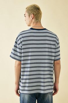 Embroidered logo tee by BDG, designed with a multi-stripe print and a stitched logo to chest. Boxy-cut tee with a contrast crew neck, drop shoulders and short sleeves. Exclusive to UO. Content + Care 100% Cotton Machine wash Imported Size + Fit Model is 185cm/6'1" and wearing size Medium Length: 74cm Measurements taken from a size Medium | BDG Blue Multi-Stripe Tee in Blue, Men's at Urban Outfitters Men's Shoes Accessories, Cut Tees, Stripe Tee, Blue Fits, Women Men Shoes, Logo Tee, Striped Tee, Logo Tees, Stripe Print