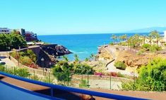 an ocean view from the balcony of a hotel