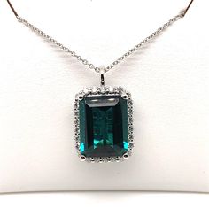 14k white gold necklace with a 8.69ct, emerald cut, Blue Tourmaline with .56cts of Diamonds. This was made by the store owner, and, if you have any questions, please don't hesitate to call Bob at 973-543-7833 or send us a message. Thank you for visiting! Formal Fine Jewelry Emerald Necklace With Baguette Cut, Formal Fine Jewelry Baguette Cut Emerald Necklace, Formal Baguette Cut Emerald Necklace In Fine Jewelry Style, Formal Emerald Rectangular Pendant Jewelry, Formal Baguette Cut Emerald Necklace, Elegant Rectangular Emerald Necklace For Formal Occasions, Elegant Rectangular Emerald Necklace For Formal Events, Formal Emerald Gemstones With Accents, Fine Jewelry Emerald Cut Emerald Necklace For Formal Events