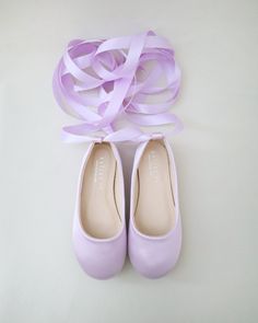 Elegant satin ballerina flats for a girl who is looking for comfort and simple chic style. Perfect for flower girls, pair up with tutu ballerinas, fairies or birthday parties. DETAILS: COLORS AVAILABLE: Black, Burgundy, Champagne, Fuchsia, Dusty Pink, Hunter Green, Ivory, Lavender, Light Blue, Navy, Red, White UPPER: Synthetic upper and lining MATERIALS: Manmade outsole ORIGIN: Imported STYLE NAME: HARPER Not sure of which size to purchase? Shoes measurements are as follow: (Please note measurements taken the length of inside of shoe from toe to heel) KIDS SIZES: Newborn/Infant (soft sole bottom): - 0-3 months: 3.75 inches - 3-6 months: 4 inches - 6-9 months: 4.25 inches - 9-12 months: 4.75 inches Walker: - Size 4: 4.85 inches - Size 5: 5.15 inches - Size 6: 5.5 inches Toddler: - Size 7: 5 Flower Girls Shoes, Simple Chic Style, Shoes Costume, Birthday Shoes, Satin Ballet Flats, Flower Girl Shoes, Holiday Shoes, Purple Wedding Flowers, Ballerina Girl