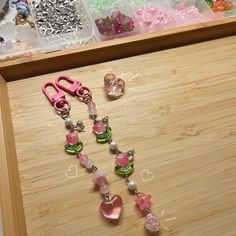 a wooden table topped with lots of crafting supplies on top of it's side