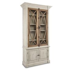 an old white china cabinet with glass doors and wood trimmings on the front