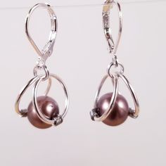 Women Glass Milk Chocolate Brown Pearl Silver Earring Wired Handmade Leverback Delicate Hand Wired Glass Pearl Earrings Total Earring Measurement Little Over An Inch Long. Lots Of Colors Available - See Other Listings Great For Bridal. Edl5 Silver Wire Earrings Handmade, Small Wire Earrings, How To Make Pearl Earrings, Silver Hypoallergenic Pearl Earrings For Party, Hypoallergenic Silver Pearl Earrings For Party, Nickel-free Silver Pearl Earrings For Party, Nickel-free Sterling Silver Pearl Earrings For Party, Nickel Free Sterling Silver Pearl Earrings For Party, Silver Wire-wrapped Earrings For Party