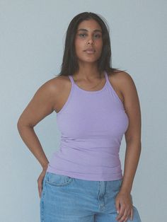 Our high neck, full length bra top has a built-in comfort crop that holds removable padding for full coverage and premium comfort. Go braless in style! Support: Low to Medium Fit: True to size Fabric: 60% Cotton, 35% Polyester, 5% Spandex Internal Structure: Band-less (Comfort Crop Lining) Padding included: Size XXS: Small pads included Size XS-S: Medium pads included Size M-L: Large pads included Size XL: XL pads included Size 2X-3XL: 2XL pads included Separate pad sets are available for purchase on our website - click here Trendy Solid Halter Top With Built-in Bra, Solid Color Tank Halter Top With Built-in Bra, Solid Seamless Racerback Halter Top, Solid Seamless Halter Top, Spring Yoga Halter Top, Stretch Halter Top For Athleisure, Solid Ribbed Halter Tank Top, Solid Color Halter Neck Tank Top With Seamless Construction, Solid Color Stretch Racerback Halter Top