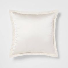 a white pillow on a white background