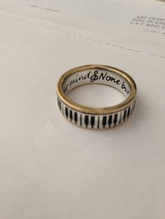 Piano Ring 9ct gold rimms by spintea on Etsy Gold Sterling Silver Engraved Ring, Silver Engraved Ring Stamped 14k For Promise, Sterling Silver Engraved Ring Stamped 14k For Promise, Promise Engraved White Gold Ring Stamped 14k, Classic Brass Engraved Ring For Anniversary, Brass Engraved Ring With Polished Finish For Anniversary, Anniversary Brass Engraved Ring With Polished Finish, Anniversary Engraved Brass Ring With Polished Finish, Silver Brass Jewelry With Engraving Option