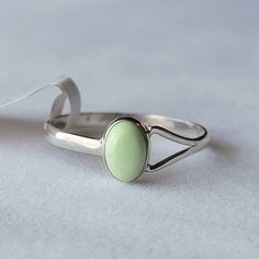 Sterling Silver Lemon Chrysoprase Ring Signed/Stamped Nj 925 925 Sterling Silver Genuine Gemstone Condition: New With Size Tag Dainty Split Shank Cabochon Size 7 See Mandrel Photo For Exact Sizing Lemon Chrysoprase Stimulates Dynamic 'Thinking Out Of The Box, And Meditation Can Facilitate Visions And A Deep Peaceful State. Lemon Chrysoprase Helps Harmonize Relationships, Stimulating Self Love And Passion. Lemon Chrysoprase Assists In Uncovering Deceitful Unconscious Thought. (Also Called Citron Silver Chrysoprase Cabochon Emerald Ring, Silver Turquoise Ring With Cabochon Chrysoprase, Green Oval Opal Ring In Sterling Silver, Green Turquoise Ring For Gift, Green Turquoise Ring For A Gift, Green Turquoise Ring As A Gift, Classic Silver Ring With Jade, Classic Silver Jade Ring, Classic Green Turquoise Ring For Gifts