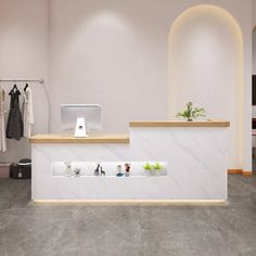 a white counter sitting inside of a store