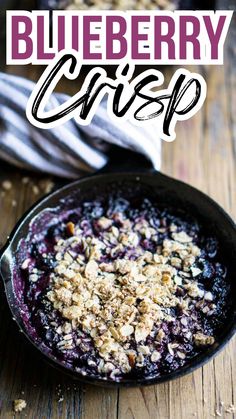 image of blueberry crisp in iron skillet on wood surface. Title text: Blueberry Crisp Best Blueberry Crisp, Easy Blueberry Crisp, Gluten Free Blueberry Crisp, Fresh Blueberry Recipes, Blueberry Crisp Recipe, Berry Crisp, Fruit Crisp, Easy Blueberry