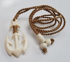 ANCHOR SHAPED BUFFALO BONE CARVED PENDANT ADJUSTABLE ROPE BEADED FASHION NECKLACE ANCHOR PENDANT MEASURES: approx 2'' LONG x 1'' WIDE NECKLACE LENGTH: PULL ROPE ADJUSTABLE UP TO 26'' PLEASE VIEW ALL PHOTOS FOR DETAIL AND CONDITION AND FEEL FREE TO ASK ANY QUESTIONS YOU MAY HAVE PLEASE TAKE A MOMENT TO VIEW OUR OTHER LISTINGS AND VISIT OUR STORE FOR A LARGE SELECTION OF ADDITIONAL ITEM JEWELRY AS WELL AS MANY OTHER ITEMS Item will ship FAST by USPS First Class Mail w/ tracking #. >>USA SELLER<< Crazy Architecture, Beaded Fashion, Carved Pendant, Anchor Pendant, Anchor Necklace, Rope Necklace, Buffalo, Nautical, Bones