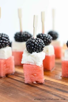 small desserts with blackberries and watermelon on them