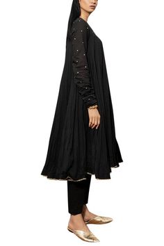 Black crinkle anarkali with placement polka dotted yoke. Comes with straight pant.
Components: 2
Fabric: Mul mul
Neckline: V-shaped neckline
Sleeve Length: Full
Color: Black
Polka dot detail; Gota patti embroidery
Churidar sleeves
Kurta with embroidered hemline - Aza Fashions Churidar Sleeves, Gota Patti Embroidery, Black Anarkali, Fashion App, Churidar, Pant Set, Black Polka Dot, Straight Pants, Set For Women