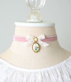 This charming coquette choker necklace is handmade with a soft double sided blush pink velvet ribbon. It features a vintage lace ribbon bow, pearl bead jewel and a beautiful vintage floral cameo with a sweet pink rose. A lovely gift for women who love to wear romantic Regency and Victorian fashion jewelry.  See last photos for coordinating designs available separately in the Rosy Posy Designs shop... a fun group gift for mothers, daughters, sisters and friends! * Size ~ Adjustable length 12 - 15 Fantasy Country, Lace Ribbon Bow, Rosy Posy, Victorian Accessories, Dolly Fashion, Pink Choker, Ribbon Choker, Pearl Jewels, Laguna Niguel