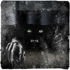 a creepy black cat with green eyes and hands coming out of it's mouth