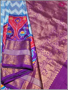 Step into this charming elegance of Kanchipuram Silk light blue saree, festooned with Ikkat pattern on its body. The blue foundation displays distinctive ikkat pattern, creating an unique and stunning look. Further it snuggled across the purple border featuring animal motif series that radiates zest for life. The vibrant purple pallu with animal motis in florals, woven in gold zari exudes perfect grandeur. The saree is accompanied by ikkat purple zari-bordered blouse, which adds opulence. Silk m Blue Tussar Silk Dupatta With Printed Border, Blue Silk Traditional Wear With Printed Border, Blue Saree With Printed Border For Festivals, Blue Pre-draped Saree With Motifs For Festivals, Blue Katan Silk Dupatta With Printed Border, Festive Blue Saree With Printed Border, Blue Traditional Wear With Printed Border For Diwali, Blue Banarasi Silk Traditional Wear With Printed Border, Designer Blue Handloom Traditional Wear