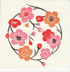 an image of a painting with flowers in the center on white paper and red, orange, and pink colors