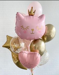 pink cat balloon bouquet with gold foil balloons