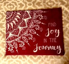 a red and white painting with the words find joy in the journey written on it