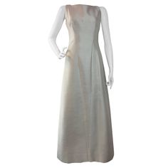 1960s Bob Bugnand Ivory Shantung Sculpted Evening Gown | From a collection of rare vintage evening dresses and gowns at https://www.1stdibs.com/fashion/clothing/evening-dresses/ 1960s Bob, Gown Princess, Fashion 1960s, Sleeveless Skirt, Ivory Silk, Evening Gown, Evening Dress, Evening Gowns, Wedding Gowns