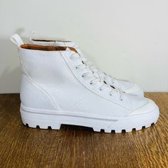 Lucky Brand Eisley High Top Sneaker. Women’s Size 9.5. White. Platform Lug Sole. Inside Zip. Nwot. Purchased New And Never Worn. No Box. White Low-top Boots For Fall, White Casual Boots With Rubber Sole, Casual White Boots With Rubber Sole, White Round Toe Sneakers For Fall, Spring Canvas Boots With Round Toe, Spring Ankle-high Cushioned Sneakers, Spring Ankle-high Sneakers With Cushioned Footbed, Spring Low-top Boots With Cushioned Footbed, Spring Low-top Boots With Laces