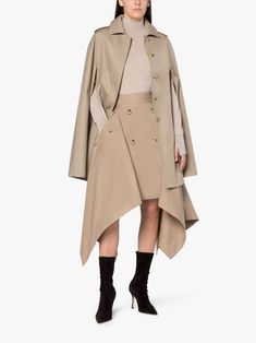 Halleigh cotton cape coat from MACKINTOSH featuring sand beige, cotton, cape design, concealed front button fastening, two side inset pockets, classic collar, epaulettes and straight hem. Designer Beige Gabardine Outerwear, Beige Cape For Fall Workwear, Long Sleeve Beige Cape For Work, Beige Long Sleeve Cape For Work, Luxury Beige Gabardine Outerwear, Cape Designs, Long Coats, Cape Coat, Sand Beige