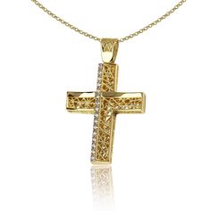 "The beauty of Greek jewelry, completely handcrafted in Greece with the old-fashioned way, is omnipresent. An outstanding 14k solid gold cross decorated with Cz remains a classic and elegant choice for everyone. Bold and traditional, you will not take your eyes off. Neither will your friends! High Quality Handmade Greek jewelry! The cross can be worn on both sides ✔ Chain Dimensions: 45 Cm ✔ Dimensions: Millimetres: 33 x 20mm ✔ High quality product. ✔ In a gift box ✔ Brand new - Made to Order ✔ Luxury Cross Necklace For Anniversary, Yellow Gold Cubic Zirconia Cross Necklace, Luxury Gold Crucifix Cross Necklace, Yellow Gold Cubic Zirconia Cross Jewelry, Yellow Gold Cross Pendant For First Communion, Yellow Gold Cross Pendant For Baptism, Gold Cross Jewelry For Baptism, Elegant Cross Pendant Jewelry For Baptism, Yellow Gold Baptism Cross Pendant Jewelry