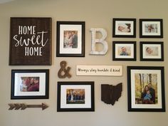 a wall with many different frames and pictures on it, including one that says home sweet home