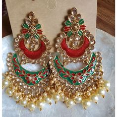 Beutiful Long Indian Style Earrings Beutiful Meenakari Kundan And Pearl Work Heavy Design But Light Weight Suitable For Any Dress And Occasions 3 Inches Long Have So Many Other Colors Pls Check My Listings For More Color Options Green Chandbalis As A Gift, Ceremonial Red Meenakari Jhumkas, Elegant Red Jhumkas For Festive Occasions, Kundan Jhumkas With Motifs For Gifts, Kundan Jhumkas With Motifs As A Gift, Red Drop Chandbalis, Red Chandelier Earrings For Festive Parties, Festive Handmade Green Bridal Earrings, Red Chandelier Earrings For Party And Festive Occasions