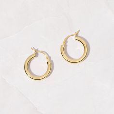 Minimalist hoop earrings that are super comfortable and great for everyday wear! Perfect for any occasion! Made of 925 Sterling Silver We use a THICK plating of 14k Gold or Rhodium for a piece that will last you years to come! 20mm Diameter 3.5mm Thickness Super lightweight Nickel-free & hypoallergenic - Great for sensitive ears! Sold as a pair Simple Everyday Hoop Huggie Earrings, Minimalist Polished Hoop Earrings, Modern Round Huggie Earrings With Ear Wire, Minimalist Simple Hoop Earrings For Everyday, Simple Hoop Huggie Earrings For Everyday, Minimalist Polished Finish Huggie Earrings, Minimalist Polished Huggie Earrings, Minimalist Round Huggie Earrings For Everyday, Minimalist Hypoallergenic Yellow Gold Hoop Earrings