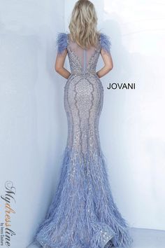 Looking for a show-stopping dress that will make you the center of attention? Look no further than the Jovani 02326. This stunning gown features intricate beading and feather embellishments, making it a truly unique piece. Whether you're attending a gala or your own wedding, this dress is sure to turn heads. Mermaid Evening Gown, Jovani Dresses, Sleeveless Gown, Embellished Gown, Feather Trim, Sleeveless Long Dress, Illusion Neckline, Pageant Dress, Evening Gowns Formal