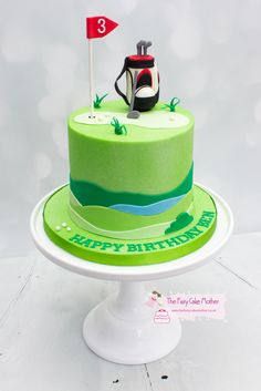 a birthday cake with a golf theme on it