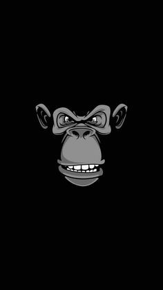 an image of a gorilla face on a black background with the word monkey in it's mouth