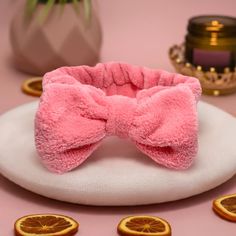 "Keep your hair off your face with our super soft face wash headband. Perfect for keeping your hair back while washing your face, wearing a face mask, or applying your makeup. Made of plush, soft fleece, it will not damage your hair. No need to worry about sizing, it's super stretchy, and one size fits all. *Featuring a large pink bow, keep it cute and feel pampered. Throw a spa party - your friends will love these matching beauty accessories #wecute. Treat yourself and pair it with our reusable Face Wash Headband, Spa Days, Eyebrow Razor, Soft Face, Makeup Remover Pads, Facial Hair Removal, Spa Party, Wash Your Face, Beauty Accessories