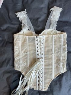 White Underbust Corset With Lace Bodice, White Lace Bodice Underbust Corset, Fitted Lace Wedding Dress With Corset Back, Lace Wedding Corset Dress With Boned Bodice, Lace Corset Dress With Boned Bodice For Wedding, Elegant Wedding Corset Dress With Lace Trim, Wedding Corset Dress With Lace Trim, Underbust Lace Corset For Weddings, Lace Underbust Corset For Wedding