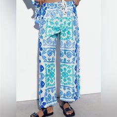 Zara Nwt Printed Poplin Pants Size Xl Blue Mid-Rise Pants Made Of Cotton. Adjustable Elastic Waistband With Drawstring. Outer Shell 100% Cotton Imported Bundle And Save Bohemian Blue Straight Leg Pants, High-waisted Pants With Pockets For Beach Season, Bohemian Blue Pants For Vacation, High-waisted Cotton Pants For Vacation, Bohemian Blue Pants For Beach Season, Cotton Wide Leg Bottoms For Beach Season, Wide Leg Cotton Bottoms For Beach Season, Cotton Wide-leg Pants For Beach Season, Blue Ankle-length Wide Leg Vacation Pants