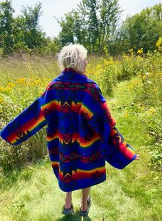 Introducing my latest creation! Reworked a beautiful cobalt blue vintage wool Pendleton blanket into this cozy,  one of a kind blanket coat. Perfect for breezy seaside mornings, autumn hikes, late nights at festivals, and campfires. Complete with double front pockets and toggle closure. Measurements: Overall length: 40" Chest: 62" Shoulder seam to wrist: 23" Oversized unisex design. Can alter sleeve length prior to shipping if needed. Model is 5'10 for reference. 100% wool. Dry clean only. This statement jacket was made with all of my heart, for any human, anywhere, that may be attracted to its vibe! My intention is that the piece will amplify the divine nature of your inner being. ✨🌙 Blanket Jacket Diy, Desert Night Sky, Wool Blanket Coat, Desert Night, Inner Being, Blanket Jacket, Pendleton Blanket, Blanket Coat, Statement Jacket