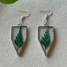 These Earrings Are Made With Resin And Dried Pressed Fern Leaves They Come With Hypoallergenic Earring Hooks They Are Made To Order So Each Pair Is Unique And Brand New Forest Earrings, Minimalistic Earrings, Pressed Fern, Fall Apparel, Diy Resin Projects, Fern Leaves, Fern Leaf, Hypoallergenic Earrings, Air Bubbles