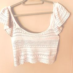 Adorable Crop Top In Off-White (Looks Pink In The Pictures); No Tags But Appears To Be Unworn; Lingerie Straps Attached; Size M. Bundle With The Denim Shorts In My Closet For Extra Savings! White Pointelle Knit Tank Top For Summer, White Seamless Summer Top, Feminine White Sleeveless Crop Top, White Sleeveless Feminine Crop Top, White Seamless Crochet Top For Summer, White Open Knit Crop Top For Beach, White Feminine Crochet Lace Top, White Crochet Lace Crop Top, White Crochet Sleeveless Crop Top