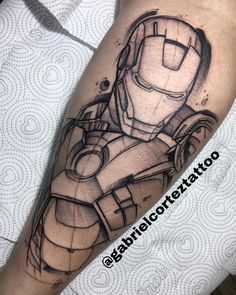 a man's leg with a drawing of iron man on the side of his leg