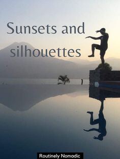 a man standing on top of a rock next to a body of water with the words sunsets and silhouettes