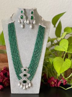 Gorgeous Victorian theme Green beads with white Rhodium/ Silver finished statement Necklace with matching earrings traditional set that goes well with your traditional outfits. This haram's measurements are given in one of the pictures.  Please take a look before you order! Measurements of the earrings: Height of earrings: 7.7 Cm  Width of earrings: 3 Cm  We tried our best to picture the item as close to original as possible. But please be aware of minor variations in shade due to digital pictur Traditional Silver Beaded Kundan Necklace, Traditional Silver Beaded Jewelry For Formal Occasions, Traditional Silver Beaded Bridal Necklace, Traditional Festive Jewelry Sets With Silver Beads, Traditional Beaded Jewelry For Formal Occasions, Elegant Green Jewelry For Eid, Traditional White Jewelry Sets With Polished Beads, Traditional Polished Beads Earrings For Wedding, Traditional Silver Jewelry Sets With Round Beads