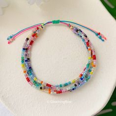 Bright colorful seed bead boho bracelet for women, Dainty multicolored stacking bracelet, handmade beach gift for her 💟 M A I N ∙ M A T E R I A L Seed beads / Nylon cord  💟 S I Z I N G ➙ Adjustable knot ➙ One size fits MOST 💟 P A C K A G I N G ∙ R E C E I P T S  ➙ All items are nicely packaged ready to gift in elegant jewelry boxes. ➙ As so many of our orders are gifts, I do not include receipts in any of our packaging. Receipts can be found under your purchases on Etsy. 💟 P L E A S E ∙ R E Adjustable Knot, Beach Gifts, Boho Bracelet, Bracelet Handmade, Bracelet For Women, Jewelry Boxes, Crafty Things, Boho Bracelets, Elegant Jewelry