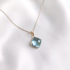 This stunning pendant is set in 14k Solid Yellow Gold with Natural Aquamarine with utmost precision. It is an unique gemstone pendant for nearly every occasion and is completely hassle-free jewelry. 🔷ABOUT GEMSTONE: Aquamarine is often considered a calming and soothing stone. It may help reduce stress, anxiety, and feelings of overwhelm, promoting a sense of tranquility and peace. Aquamarine is thought to enhance courage and inner strength. It may help individuals overcome fears and phobias and Aquamarine Gem, Handmade Jewelry Box, Aquamarine Pendant, Aquamarine Necklace, Aquamarine Jewelry, March Birthstone, Bezel Pendant, Aquamarine Stone, Birthstone Pendant