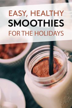 a glass jar filled with chocolate and milk next to two mugs full of coffee