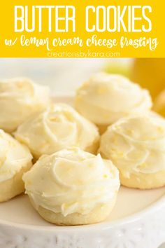 butter cookies with lemon cream cheese frosting on a white plate